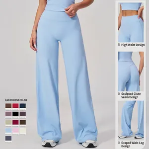 High waist light blue wide leg yoga pants featuring peach lift seam and draped fit