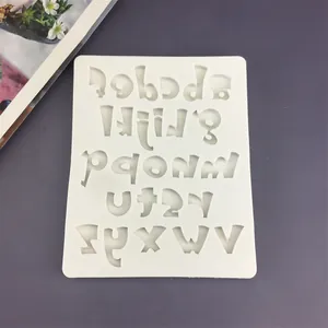 Detailed top view of a white silicone mold with 26 lowercase letters and ampersand