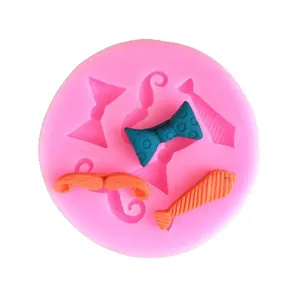 Pink silicone mold for DIY mustache, bow tie and necktie fondant cake decorations