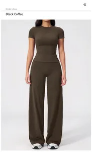 Full body view of dark coffee high-waisted wide-leg yoga pants and fitted t-shirt