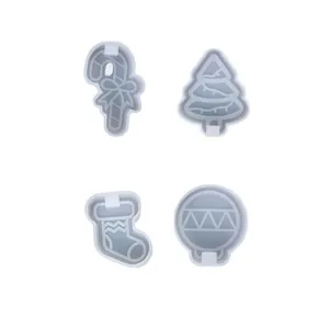 Set of 4 Christmas silicone ice pop molds featuring tree, sock, and candy cane shapes
