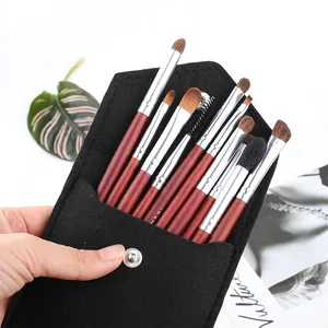 Set professionale da 10 pennelli trucco color mogano con custodia in feltro nero e bottone