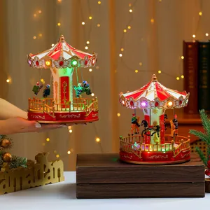 Close-up of a glowing musical carousel featuring red and white colors with gold reliefs