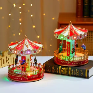 Close-up of glowing carousel music box with LED lights and festive gold carvings