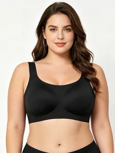 Detail of plus size seamless bra with wide shoulder straps and supportive black fabric