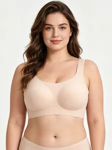 Detail of nude seamless wireless bra featuring wide straps and soft support fabric