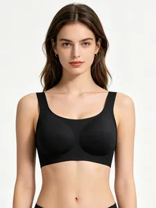 Detail of black seamless sports bra with wide straps and smooth supportive texture