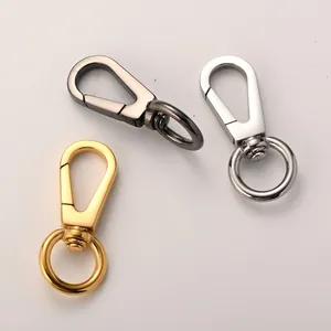 Set of titanium steel swivel keychains in gold, silver and gun black finishes