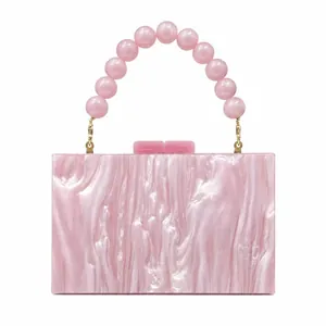 Pink marble texture acrylic evening clutch bag with beaded handle for weddings