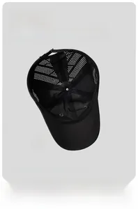 Detail view of the breathable laser-cut mesh and adjustable strap on a black sports cap