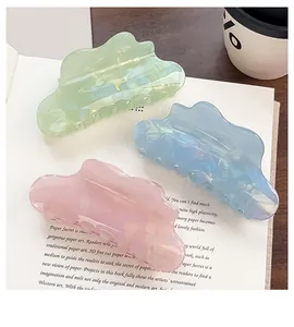 Three-piece set of translucent cloud-shaped hair claws in pink, blue, and green colors