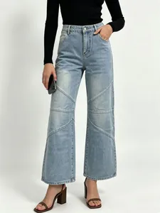 Detailed view of diagonal stitching on high-waisted wide-leg light blue washed jeans