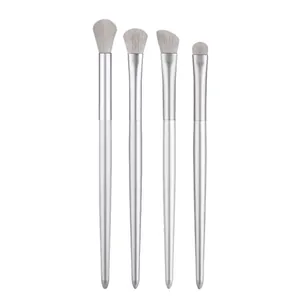 4-piece silver eyeshadow makeup brush set with grey soft bristles for blending and detail
