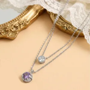 Double-layered silver necklace with purple water drop zircon and heart pendant