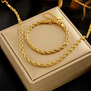 Polished gold rope chain necklace and bracelet set in stainless steel on a black velvet box