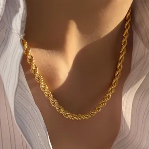 Polished gold rope chain necklace for women shown on neck over a white shirt
