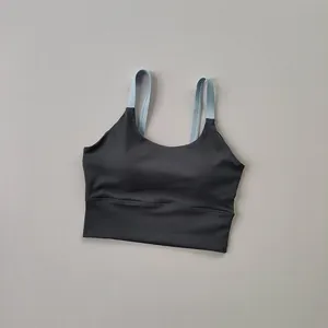 Reggiseno sportivo nero ad alto supporto con spalline azzurre a contrasto