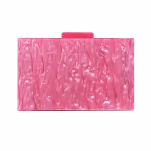 Pink acrylic evening clutch bag with marble texture and pearl finish crossbody chain