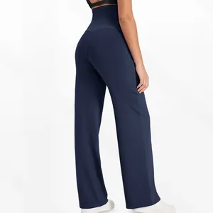 Vue détaillée du pantalon de yoga de maternité bleu marine à taille haute et jambe large