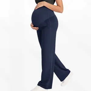Détail du pantalon de maternité avec panneau de soutien taille haute en bleu marine