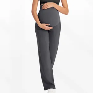 Détail du pantalon de yoga de maternité taille haute avec soutien du ventre gris foncé