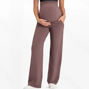 Détails de la bande de soutien du ventre et poche latérale sur le pantalon de grossesse