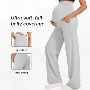 Détail du pantalon de yoga gris pour maternité avec couverture souple du ventre