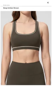 Detail view of dark brown yoga set featuring racerback sports bra and high waist leggings