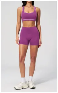 Detail view of purple sports bra with white contrast piping and high elasticity fabric