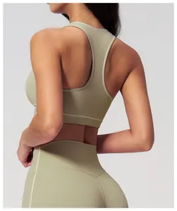 Detail view of racerback cutout design on grey-green high-elastic sports bra