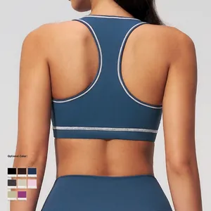 Deep blue racerback sports bra and yoga leggings set with white contrast stitching
