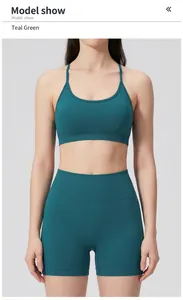 Front view of seamless ribbed sports bra and high-waist yoga shorts set in soft emerald green