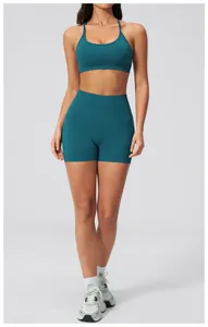Detail of dark teal seamless ribbed yoga set with sports bra and high-waist shorts