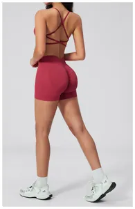Macro shot of seamless scrunch butt yoga shorts and crisscross sports bra back detail