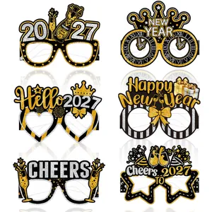 Detailed view of six 2027 New Year party glasses with glitter gold and silver finish