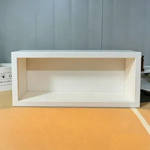 Macro detail of minimalist white rectangular display box with matte finish