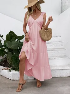 Detail of pink V-neck tiered maxi dress with ruffles for elegant summer vacation style