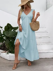 Detail of light blue tiered maxi dress with V-neck and ruffled sleeveless design