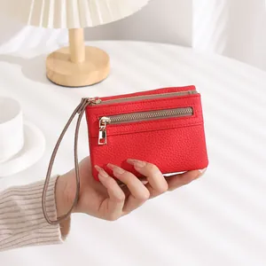 Red lychee texture long wallet with double zippers and grey wrist strap for women