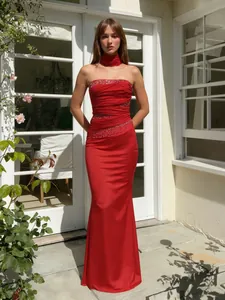 Elegant red off-shoulder satin evening gown with sequins and matching choker accessory