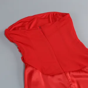Detail of red rhinestone dress back with corset boning and invisible zipper closure