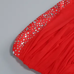 Detailed macro view of red pleated mesh fabric with sparkling silver rhinestones and crystals