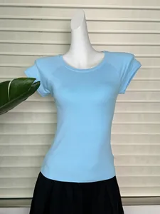 Detail of the light blue raglan short sleeve T-shirt with fine ribbed texture on mannequin