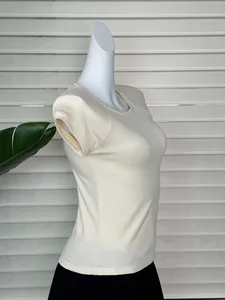 Detail view of the armpit sweat pads on an off-white slim-fit ribbed knit T-shirt
