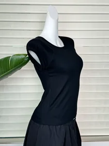 Close-up of slim-fit black t-shirt with crew neck and raglan short sleeves