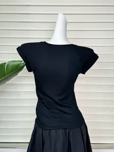 Rear view detail of black short-sleeve T-shirt with raglan sleeve design