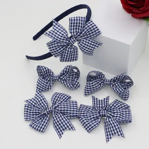 Detailed set of 5 blue gingham bow headbands and hair clips for girls hair styling