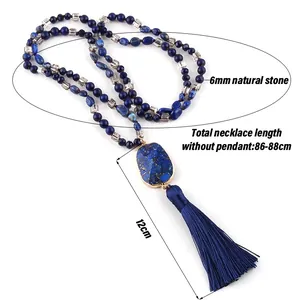 Detail of 6mm lapis lazuli beads and 12cm silk tassel on bohemian long necklace