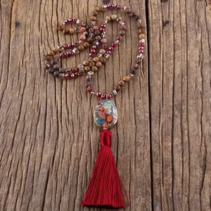 Bohemian long necklace with natural colorful gemstone pendant and red silk tassel