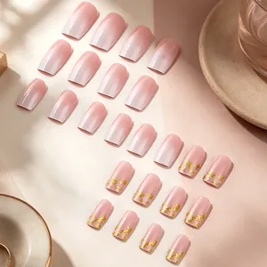 Detail view of 24pcs pink gradient press-on nails with gold foil in a neat layout